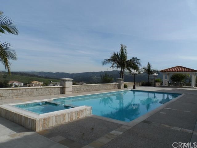 3068 Windmill Drive Diamond Bar, CA 91765 - Photo 29 of 35 a view of a swimming pool and a chair