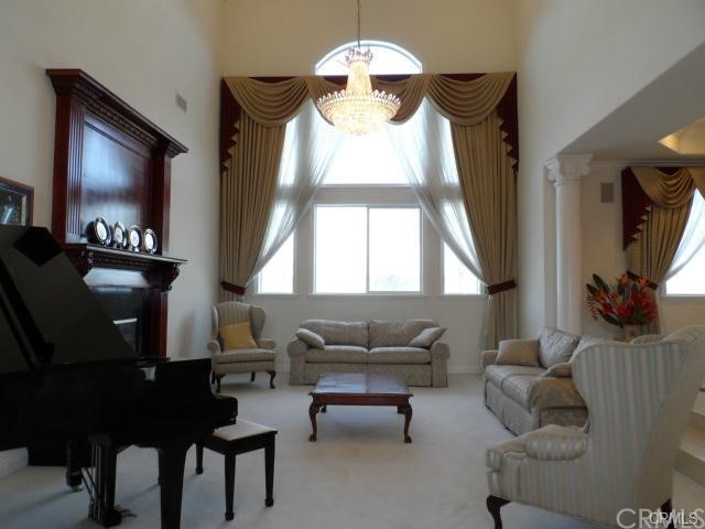 3068 Windmill Drive Diamond Bar, CA 91765 - Photo 7 of 35 a living room with furniture a window and a flat screen tv