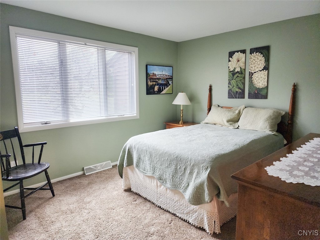 4635 Wisteria Circle Manlius, NY 13104 - Photo 20 of 27 Here is the second bedroom. You'll love the natura