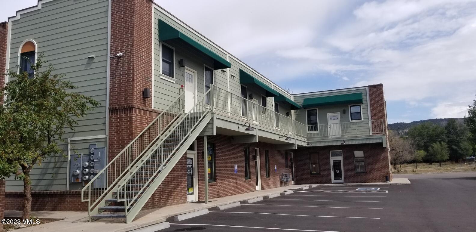 a view of a building with a street