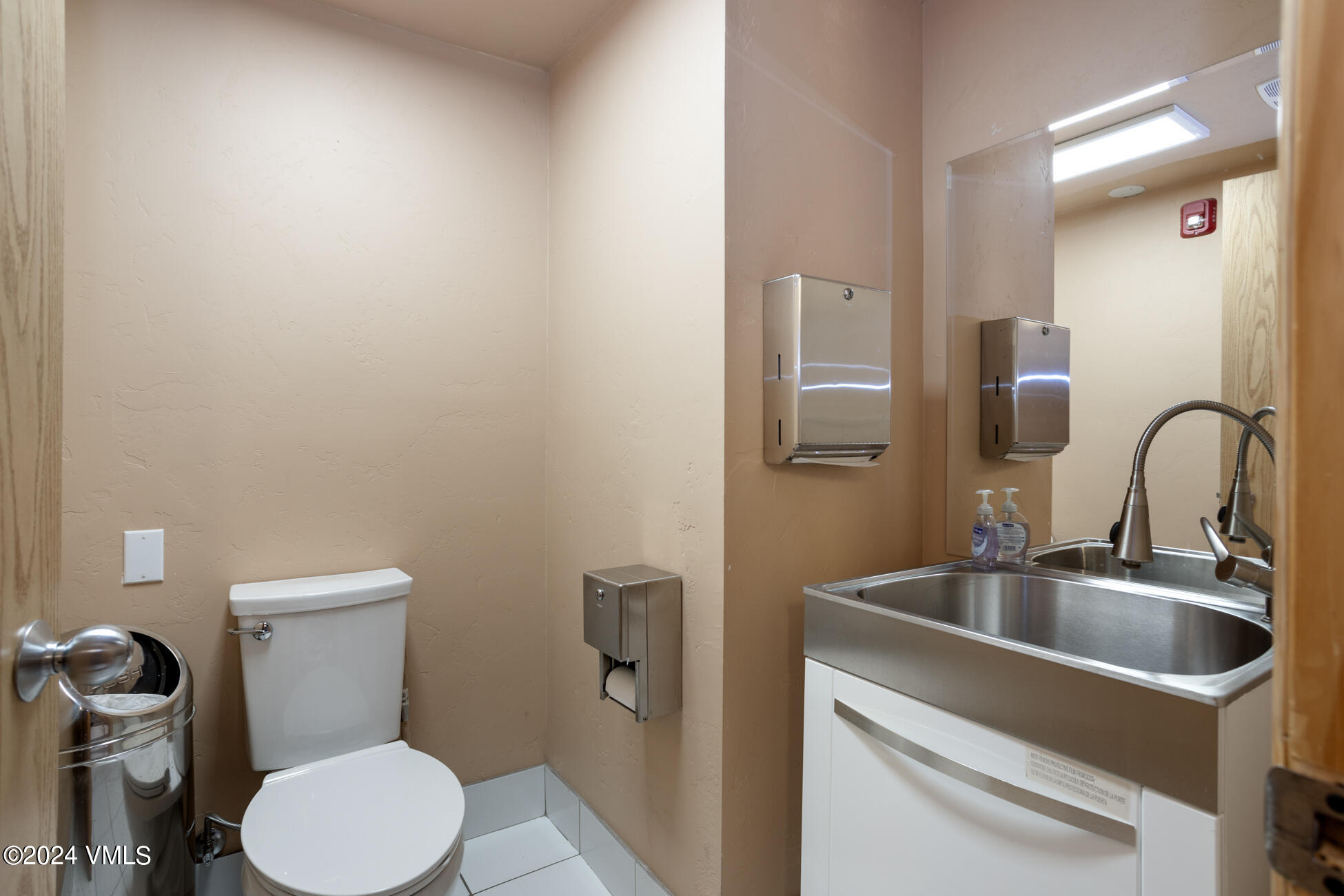 105 Capitol Street, Unit 1 2 3 4 5 6 7 8 Eagle, CO 81631 - Photo 11 of 31 a bathroom with a sink and a toilet