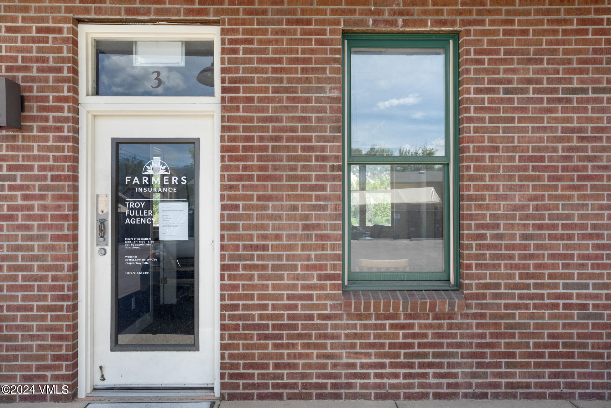 105 Capitol Street, Unit 1 2 3 4 5 6 7 8 Eagle, CO 81631 - Photo 15 of 31 a front view of a house with a glass door
