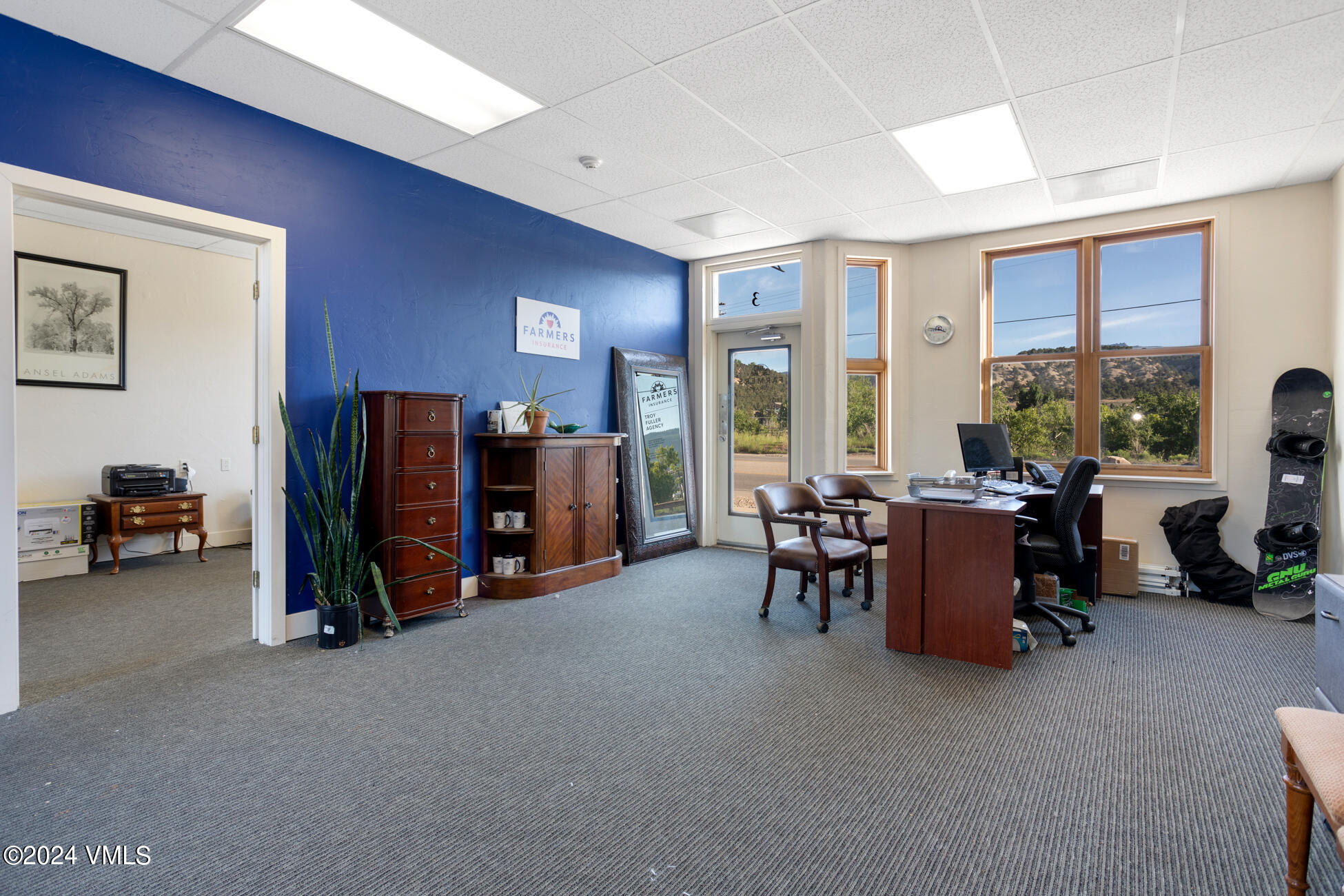 105 Capitol Street, Unit 1 2 3 4 5 6 7 8 Eagle, CO 81631 - Photo 21 of 31 a view of a livingroom with furniture and a large window