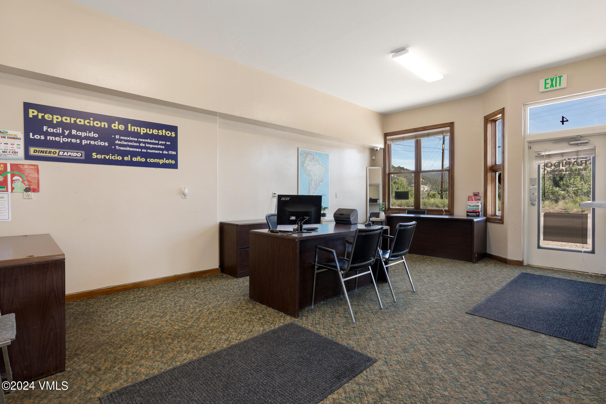105 Capitol Street, Unit 1 2 3 4 5 6 7 8 Eagle, CO 81631 - Photo 22 of 31 a workspace with furniture and window