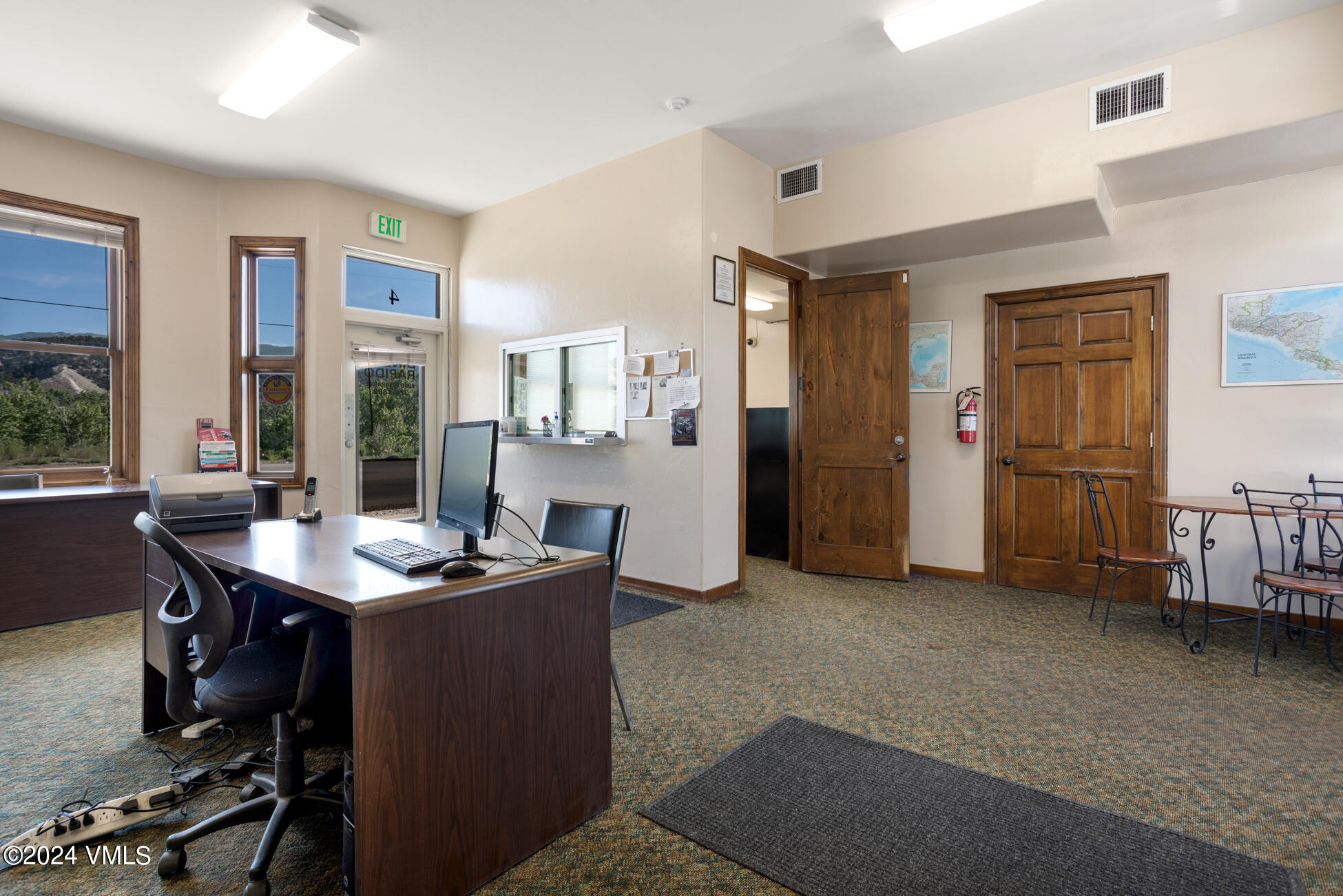 105 Capitol Street, Unit 1 2 3 4 5 6 7 8 Eagle, CO 81631 - Photo 23 of 31 a room with furniture and window