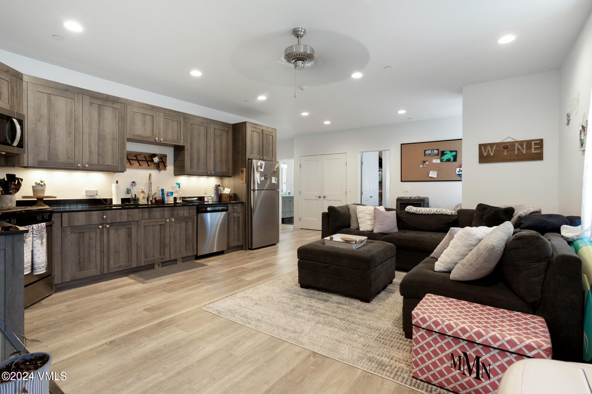 105 Capitol Street, Unit 1 2 3 4 5 6 7 8 Eagle, CO 81631 - Photo 27 of 31 a living room with stainless steel appliances kitchen island granite countertop furniture and a view of kitchen