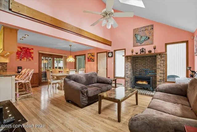 a kitchen with stainless steel appliances a refrigerator stove and microwave