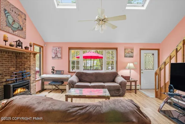 a living room with furniture and a window