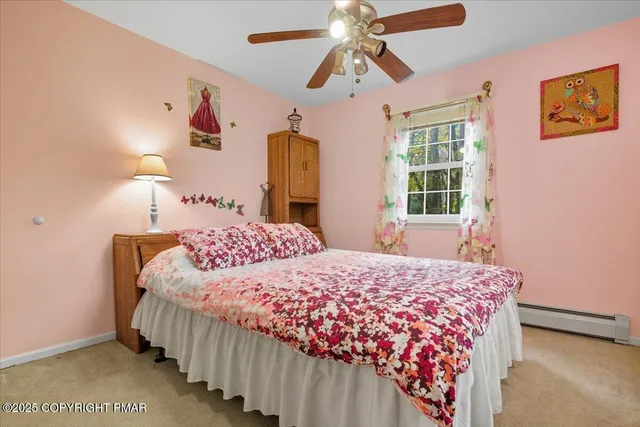 a view of a chairs and table in backyard of the house