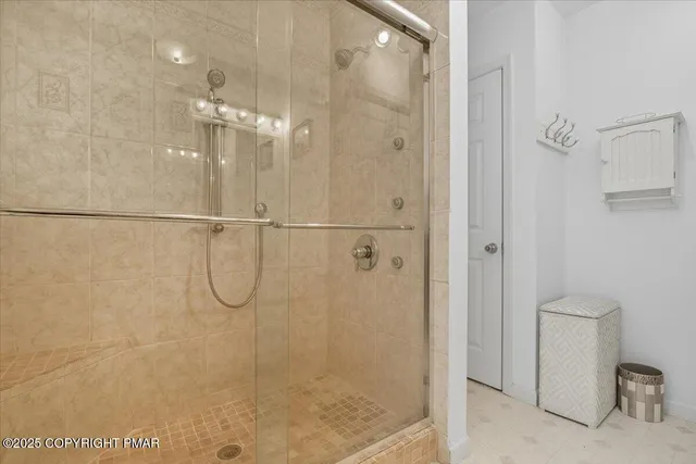 a view of a chairs and table in a backyard