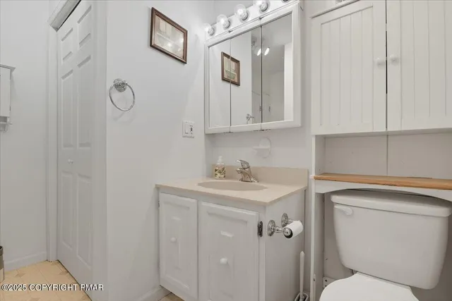 an aerial view of ocean and residential houses