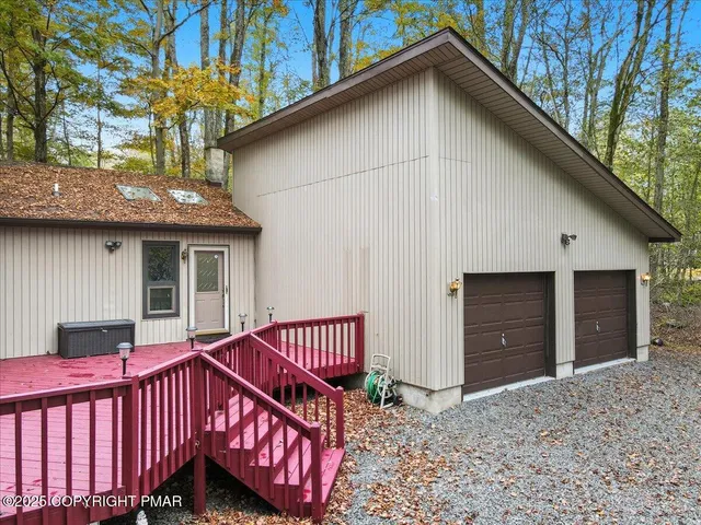 a living room with furniture flat screen tv and a fireplace