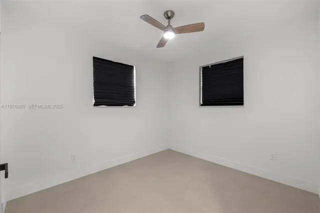 a view of a livingroom with a flat screen tv
