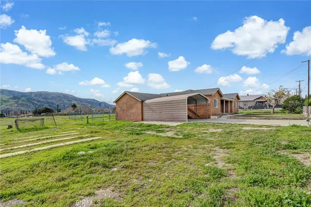 a house view with a garden space