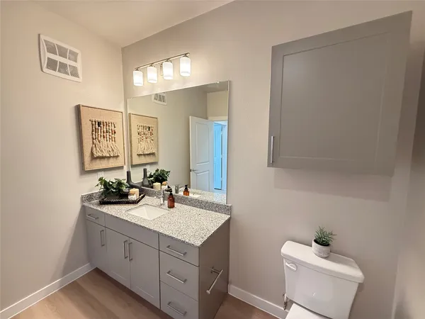 a bathroom with a shower curtain and a tub