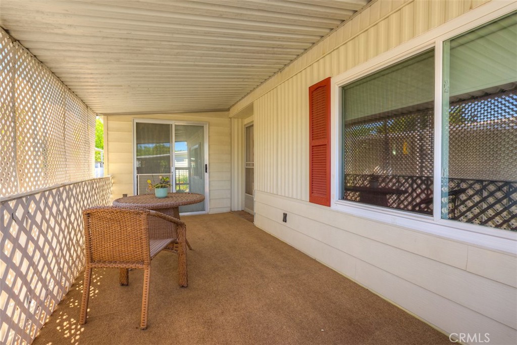1901 Dayton Road, Unit 133 Chico, CA 95928 - Photo 3 of 36 a view of a patio with table and chairs and potted plants