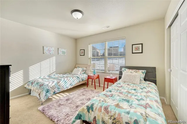 a bedroom with a bed and furniture