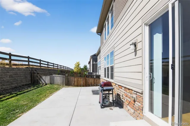 a front view of a house with a patio