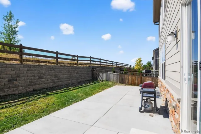 a view of swimming pool with seating space