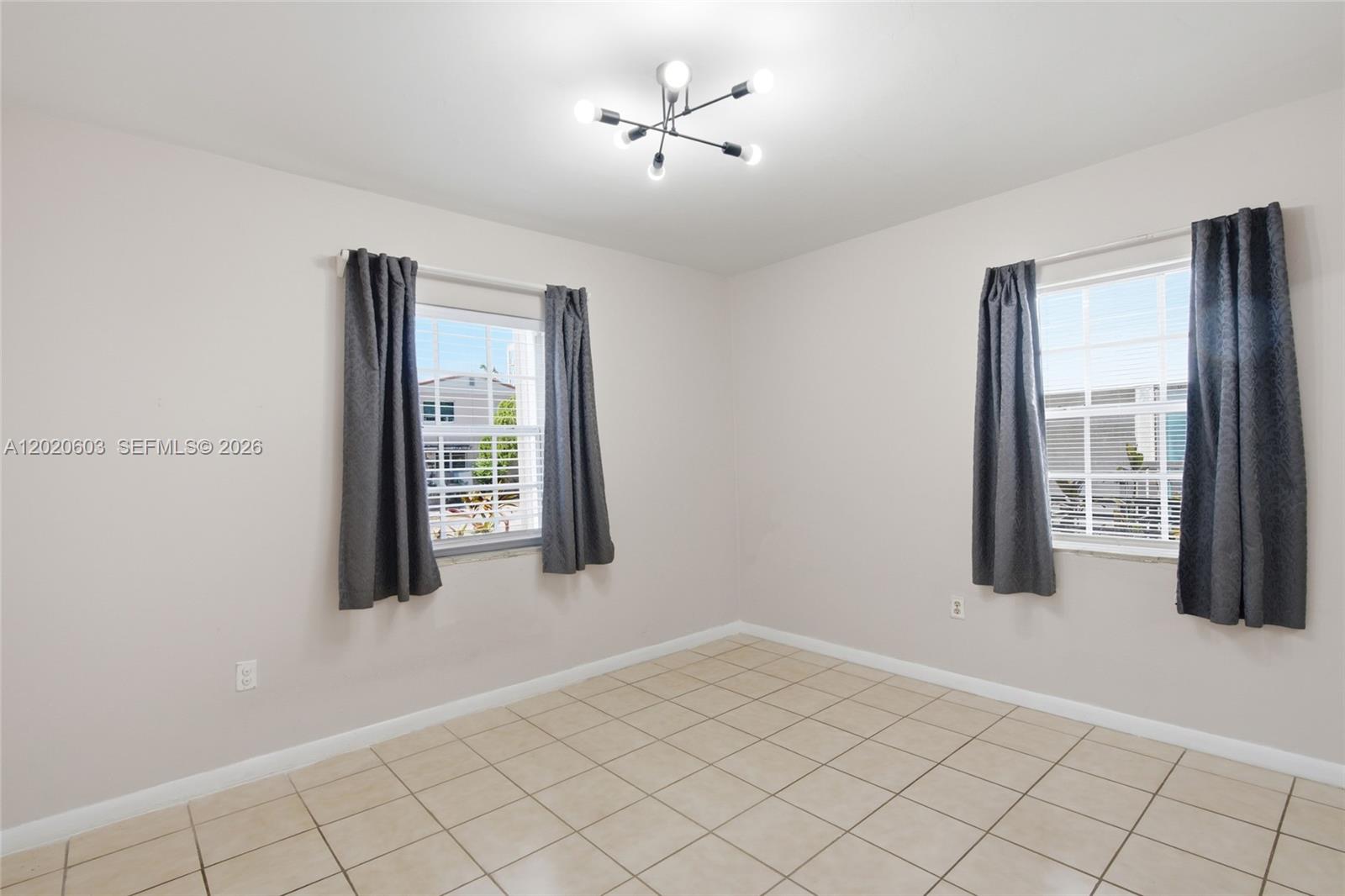 3750 Southwest 27th Street Miami, FL 33134 - Photo 10 of 41 a view of an empty room with window