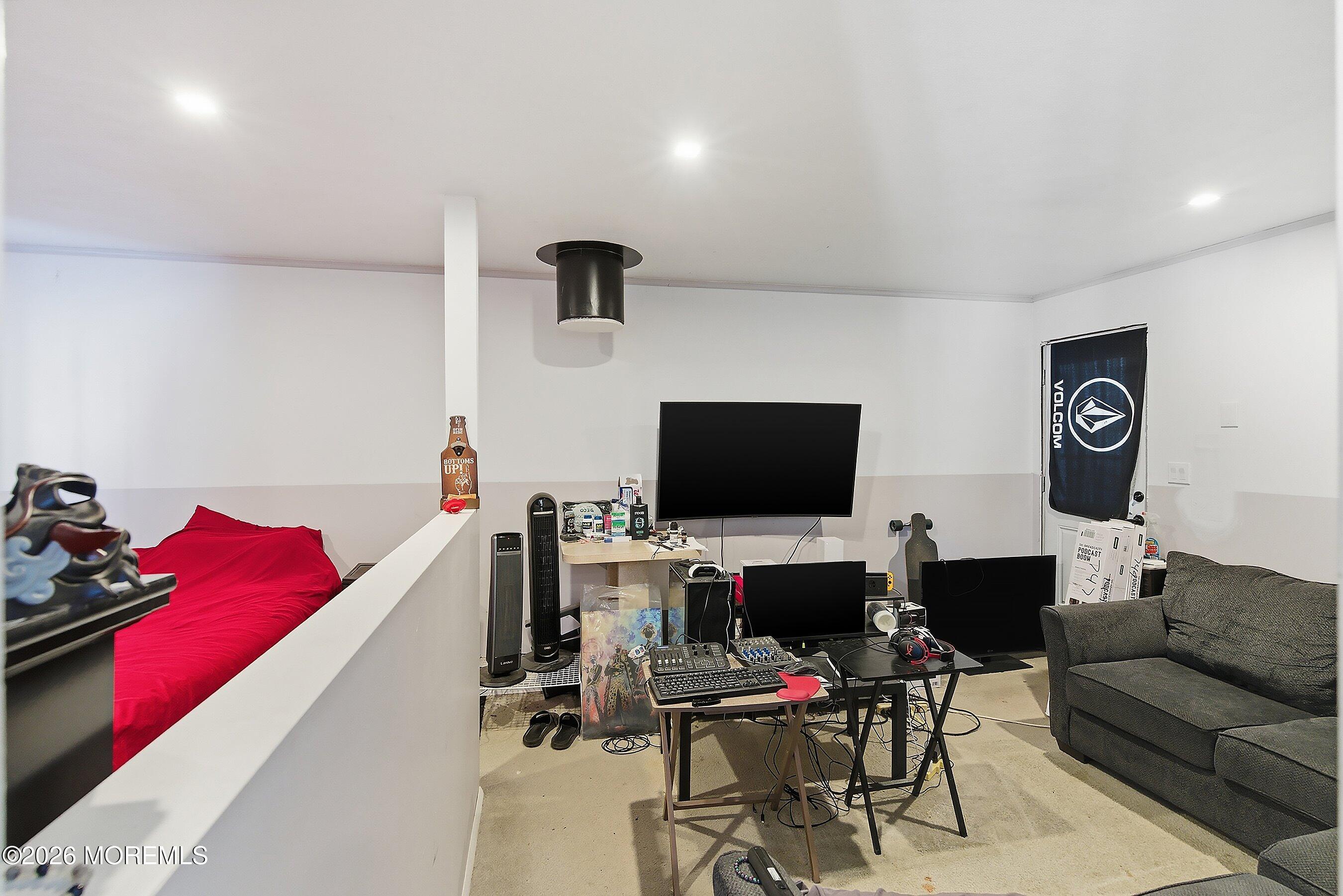 70 Oak Ridge Parkway Toms River, NJ 08755 - Photo 22 of 34 a view of a livingroom with workspace and a couch