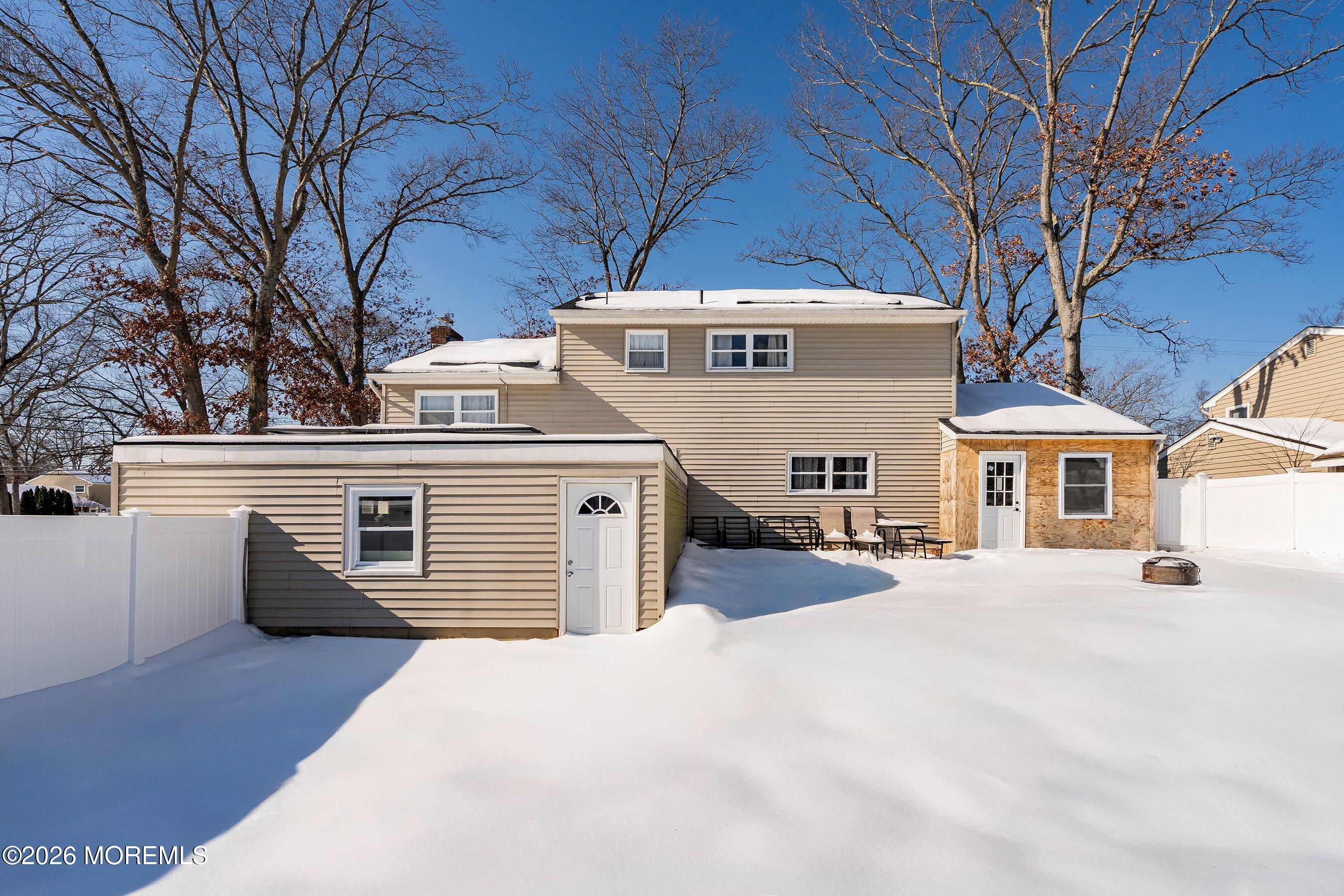 70 Oak Ridge Parkway Toms River, NJ 08755 - Photo 28 of 34 a front view of a house with a yard
