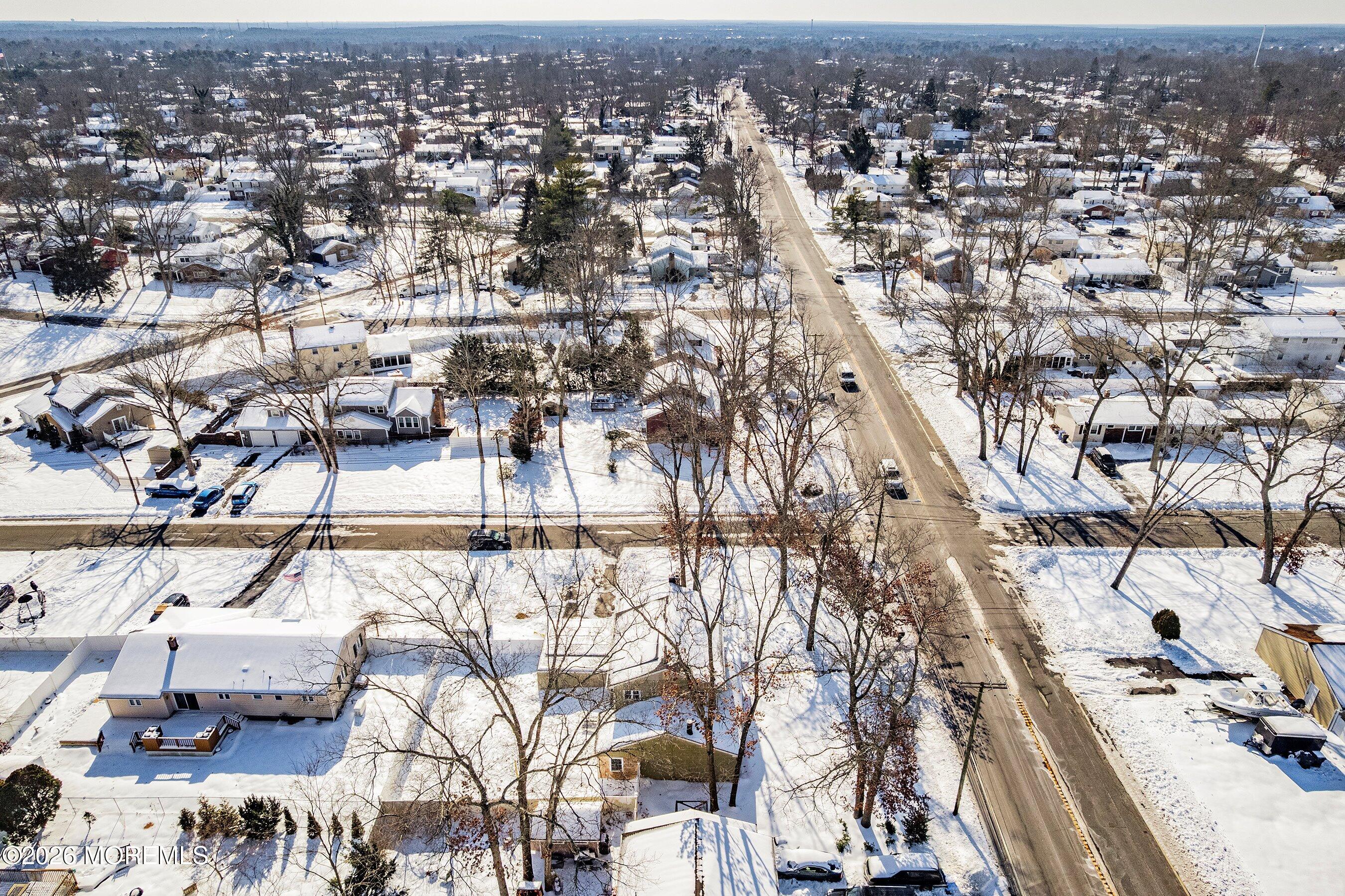 70 Oak Ridge Parkway Toms River, NJ 08755 - Photo 31 of 34 an aerial view of a city with lots of residential buildings