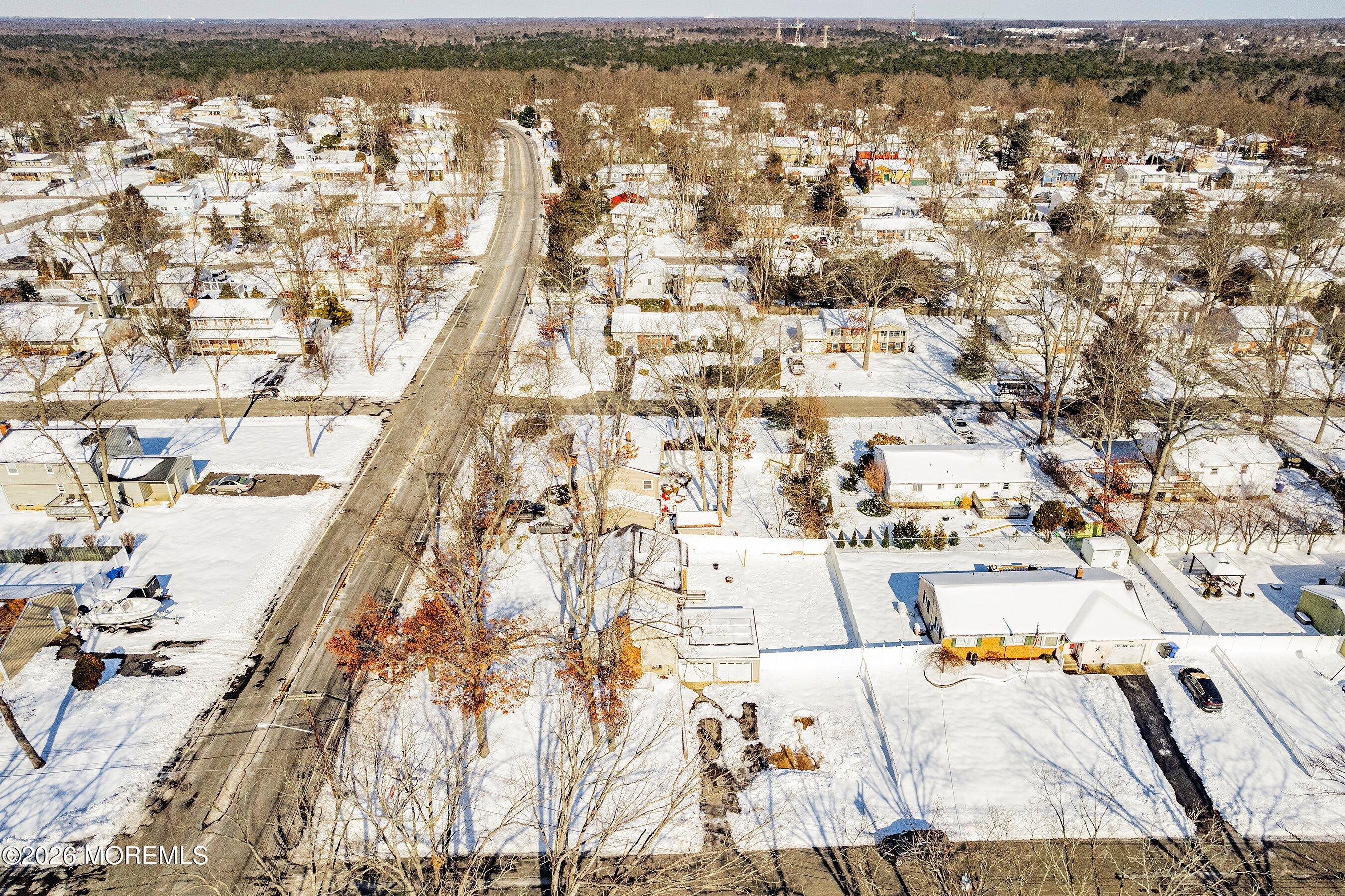 70 Oak Ridge Parkway Toms River, NJ 08755 - Photo 33 of 34 an aerial view of residential houses with yard