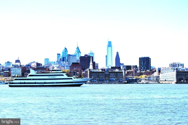 a view of a city with tall buildings