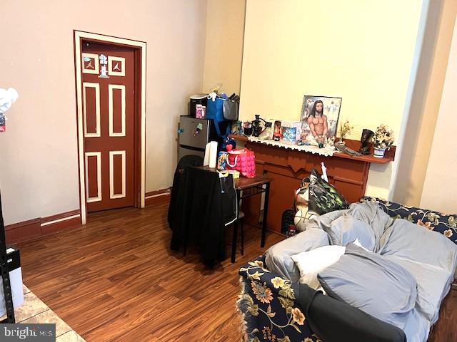 912 Point Street Camden, NJ 08102 - Photo 5 of 10 a living room with furniture and a wooden floor