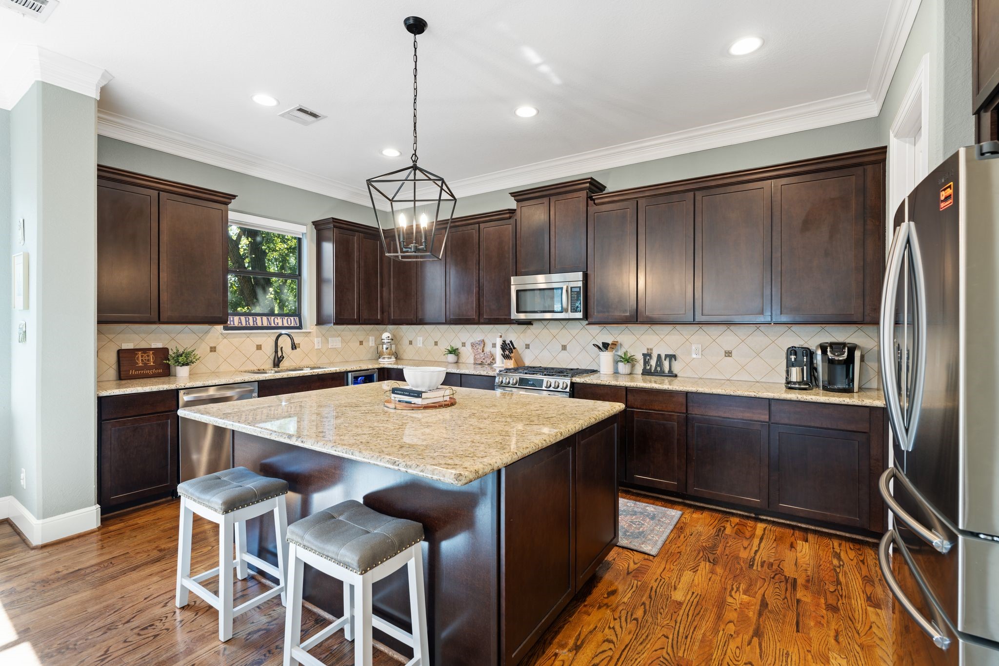 2503 Maxroy Street Houston, TX 77007 - Photo 16 of 35 Spacious kitchen with new gas range, dishwasher, and beverage fridge. Also features a walk in pantry with plenty of storage.