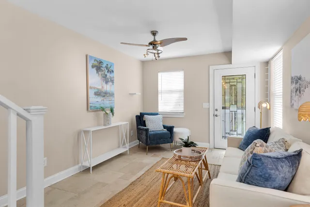 a living room with furniture and a window