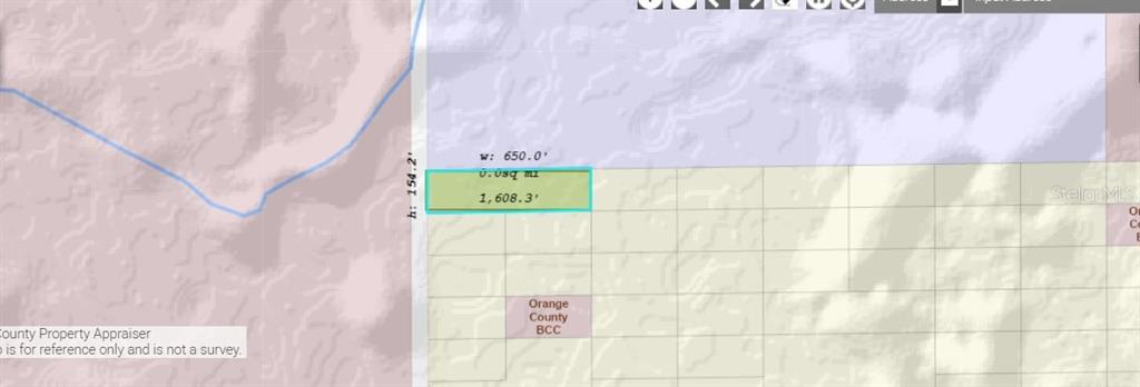 2473 Dill Road Christmas, FL 32709 - Photo 3 of 5 a bathroom with a sink and a shower curtain
