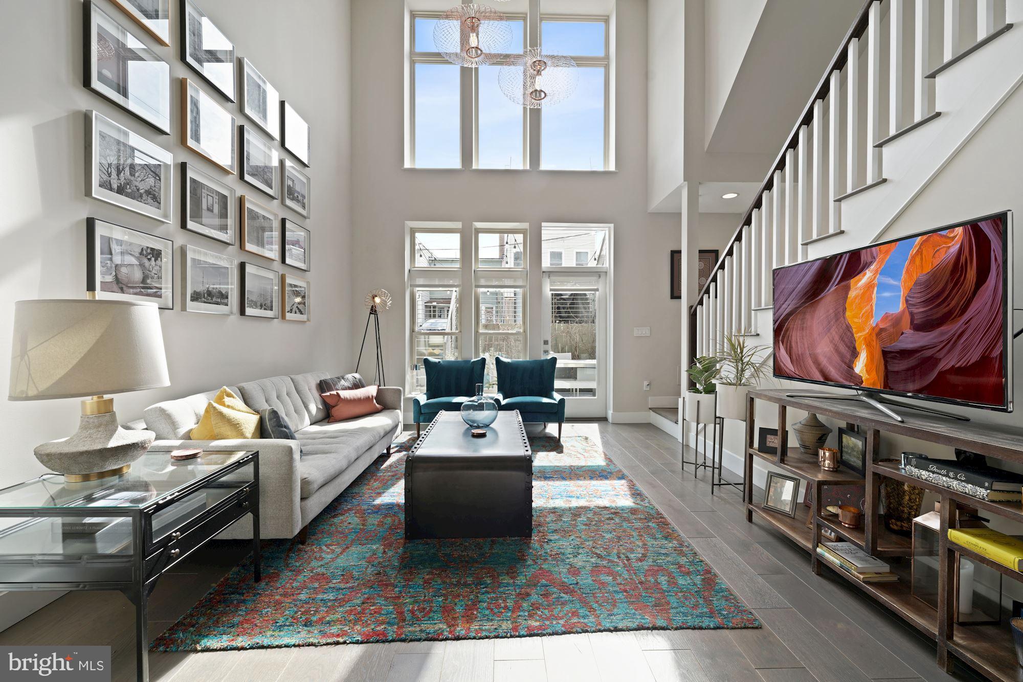 217 Randolph Place Northeast, Unit 1 Washington, DC 20002 - Photo 1 of 26 Floor to ceiling South facing windows