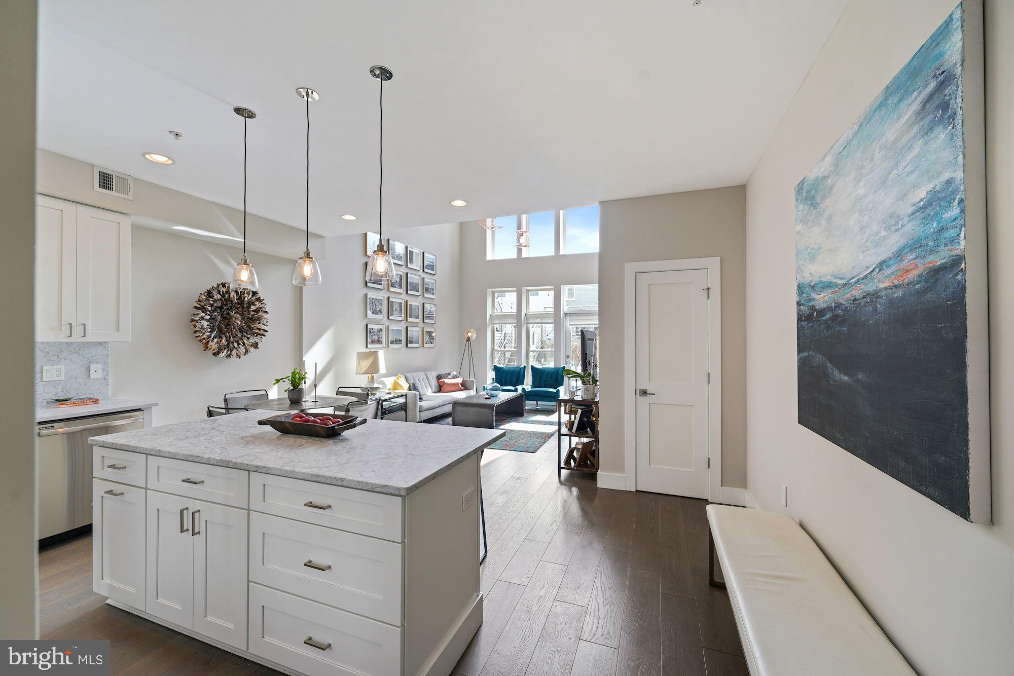 217 Randolph Place Northeast, Unit 1 Washington, DC 20002 - Photo 13 of 26 Wide plank hardwood floors throughout