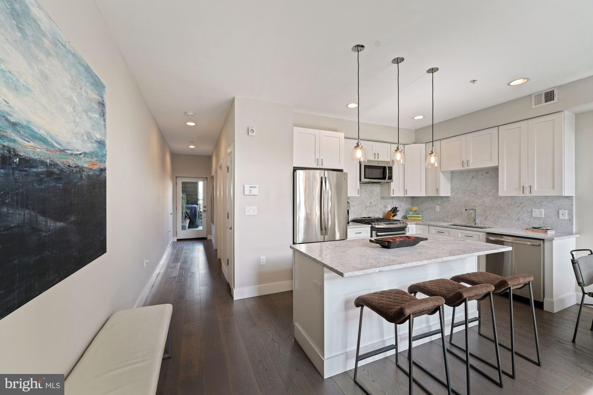 217 Randolph Place Northeast, Unit 1 Washington, DC 20002 - Photo 5 of 26 Large island with breakfast bar