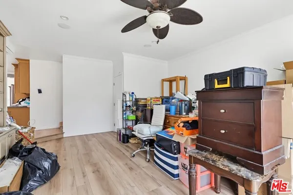 a room with furniture and wooden floor