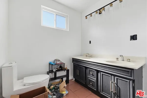 a view of livingroom with furniture and front door