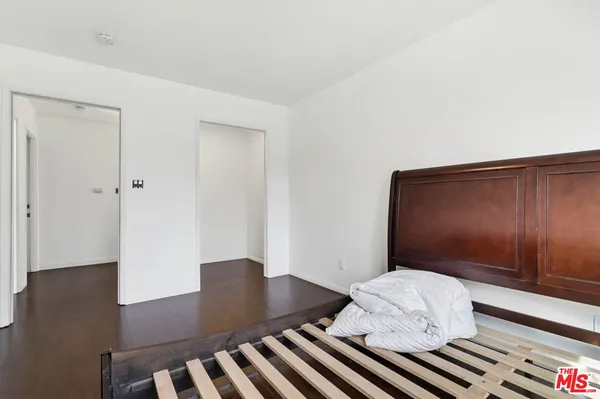 a balcony view with couple of couch and chairs