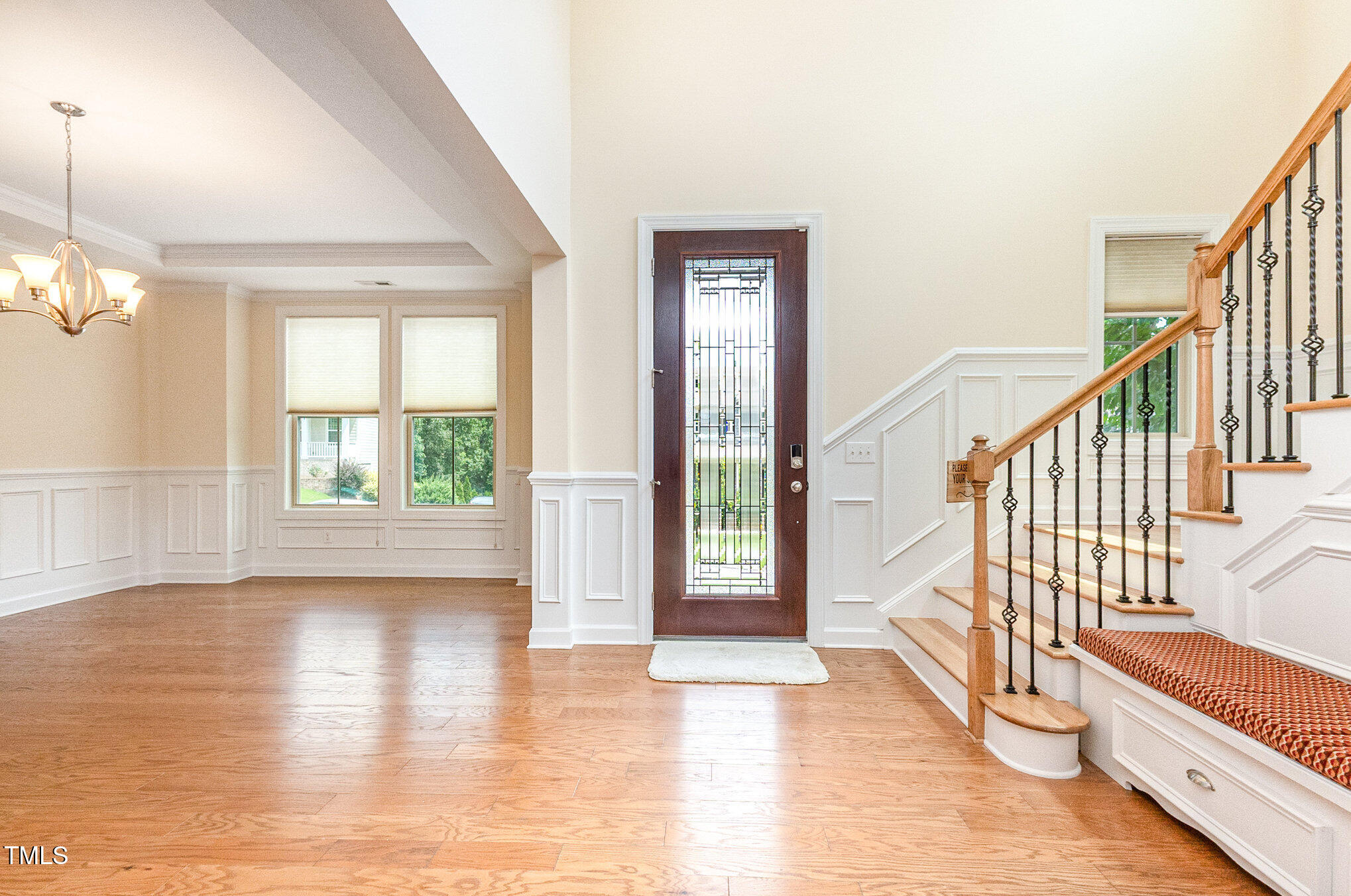 316 Matilda Place Cary, NC 27513 - Photo 20 of 69 a view of an entryway with wooden floor and door