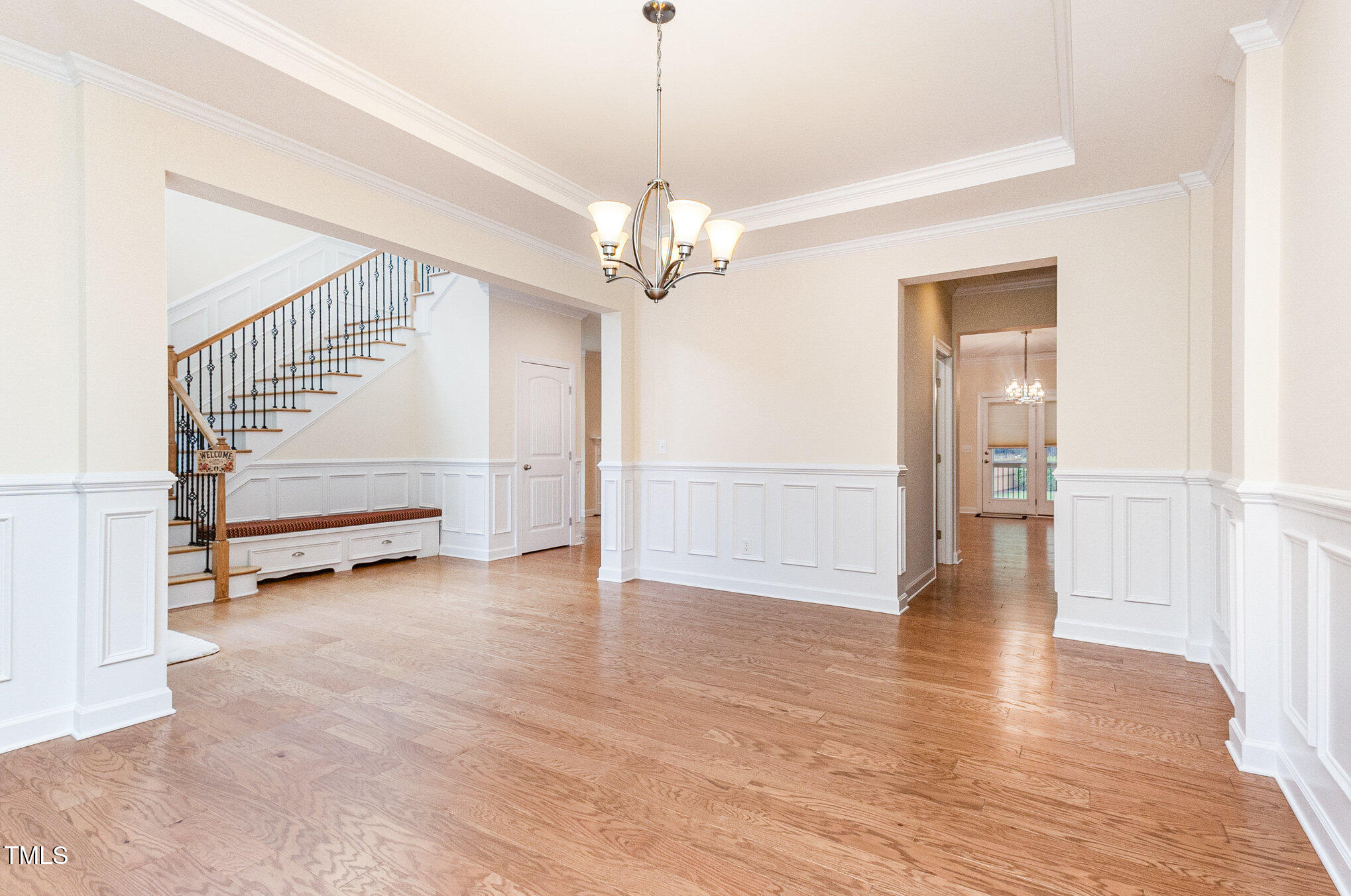 316 Matilda Place Cary, NC 27513 - Photo 24 of 69 a view of an empty room with a window and a ceiling fan