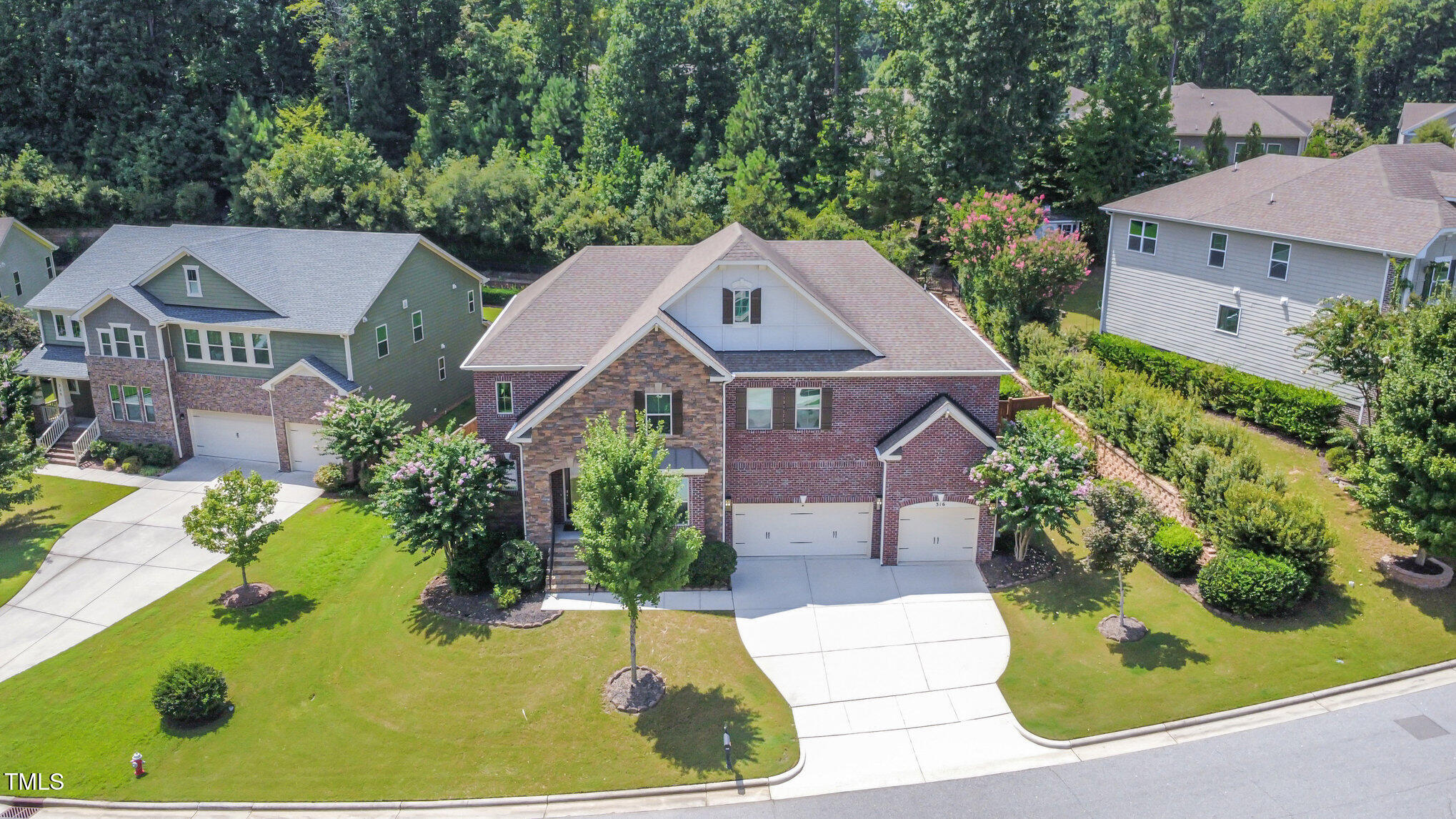 316 Matilda Place Cary, NC 27513 - Photo 4 of 69 an aerial view of a house with yard