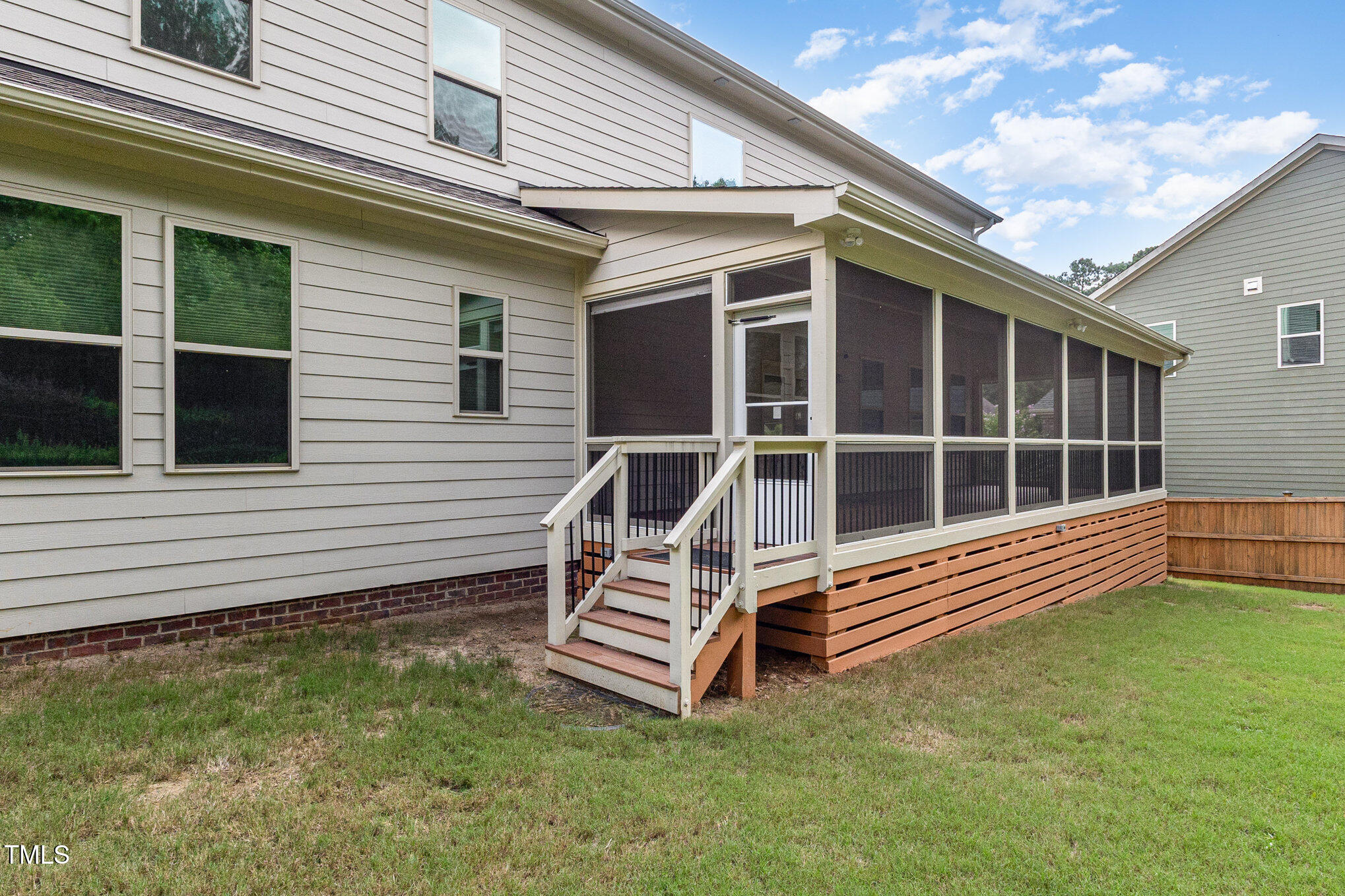 316 Matilda Place Cary, NC 27513 - Photo 63 of 69 a wooden bench sitting in front of a house