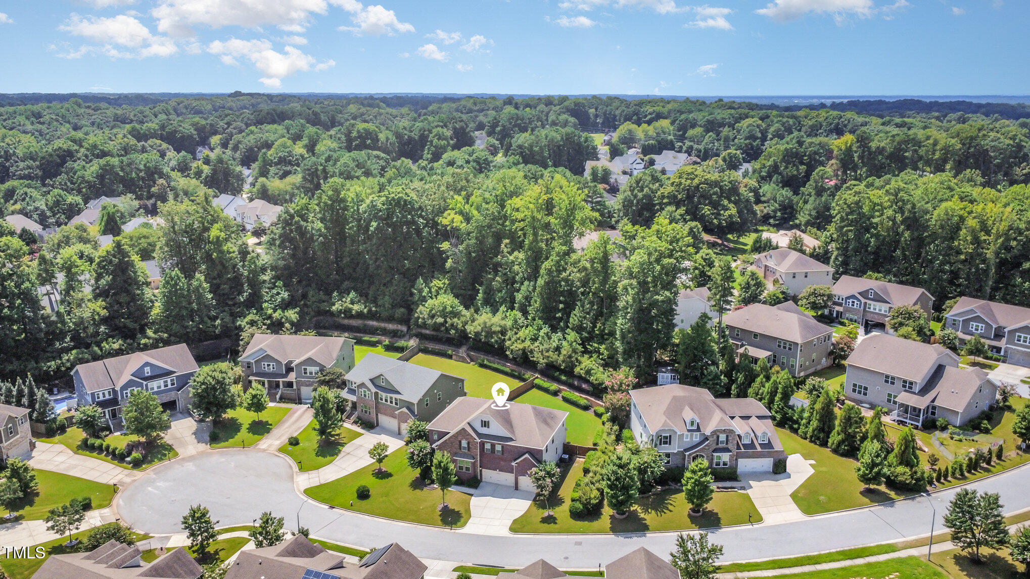 316 Matilda Place Cary, NC 27513 - Photo 69 of 69 an aerial view of a houses with a swimming pool