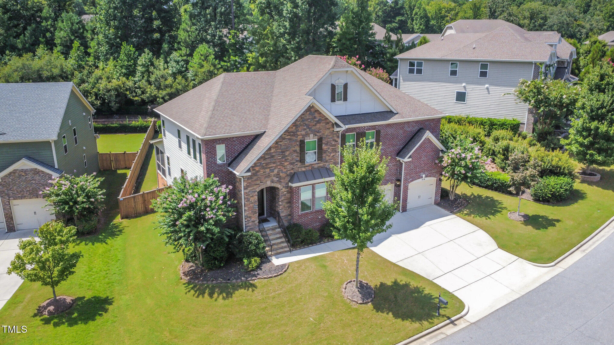 316 Matilda Place Cary, NC 27513 - Photo 8 of 69 an aerial view of a house with swimming pool