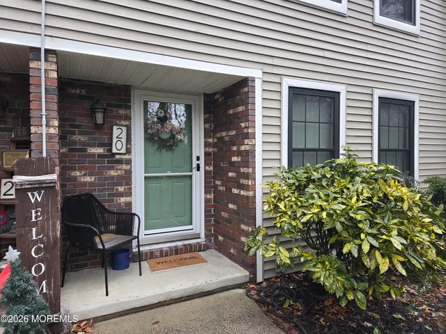 a view of a entryway door front of house
