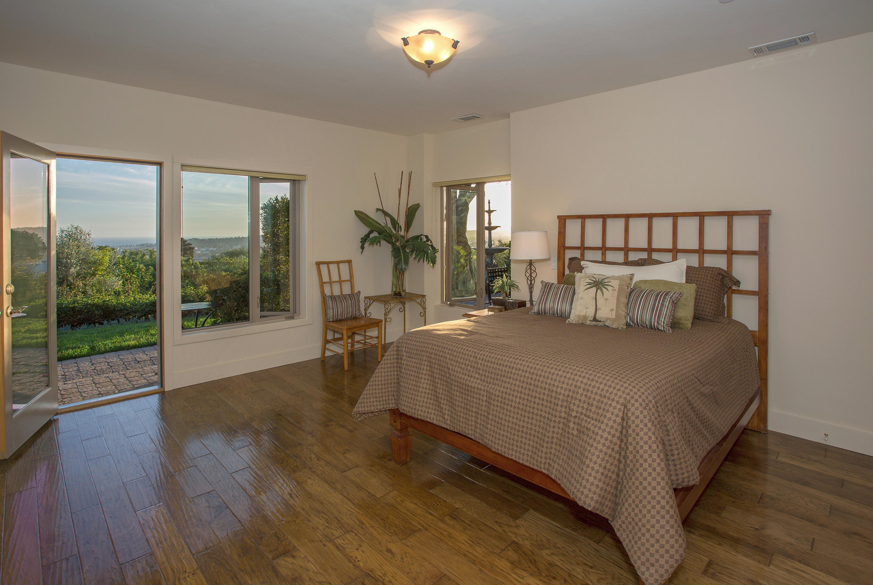 155 Cedar Lane Santa Barbara, CA 93108 - Photo 7 of 12 a bedroom with a bed and a night stand