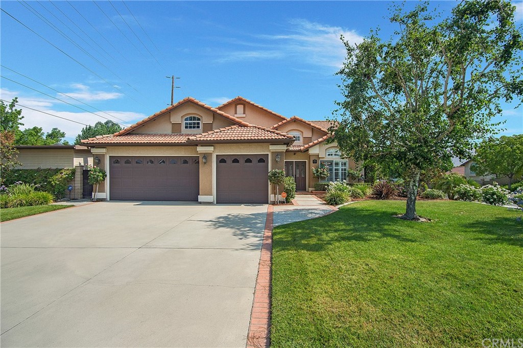 6696 Mission Grove Riverside, CA 92506 - Photo 1 of 1 a front view of a house with a yard