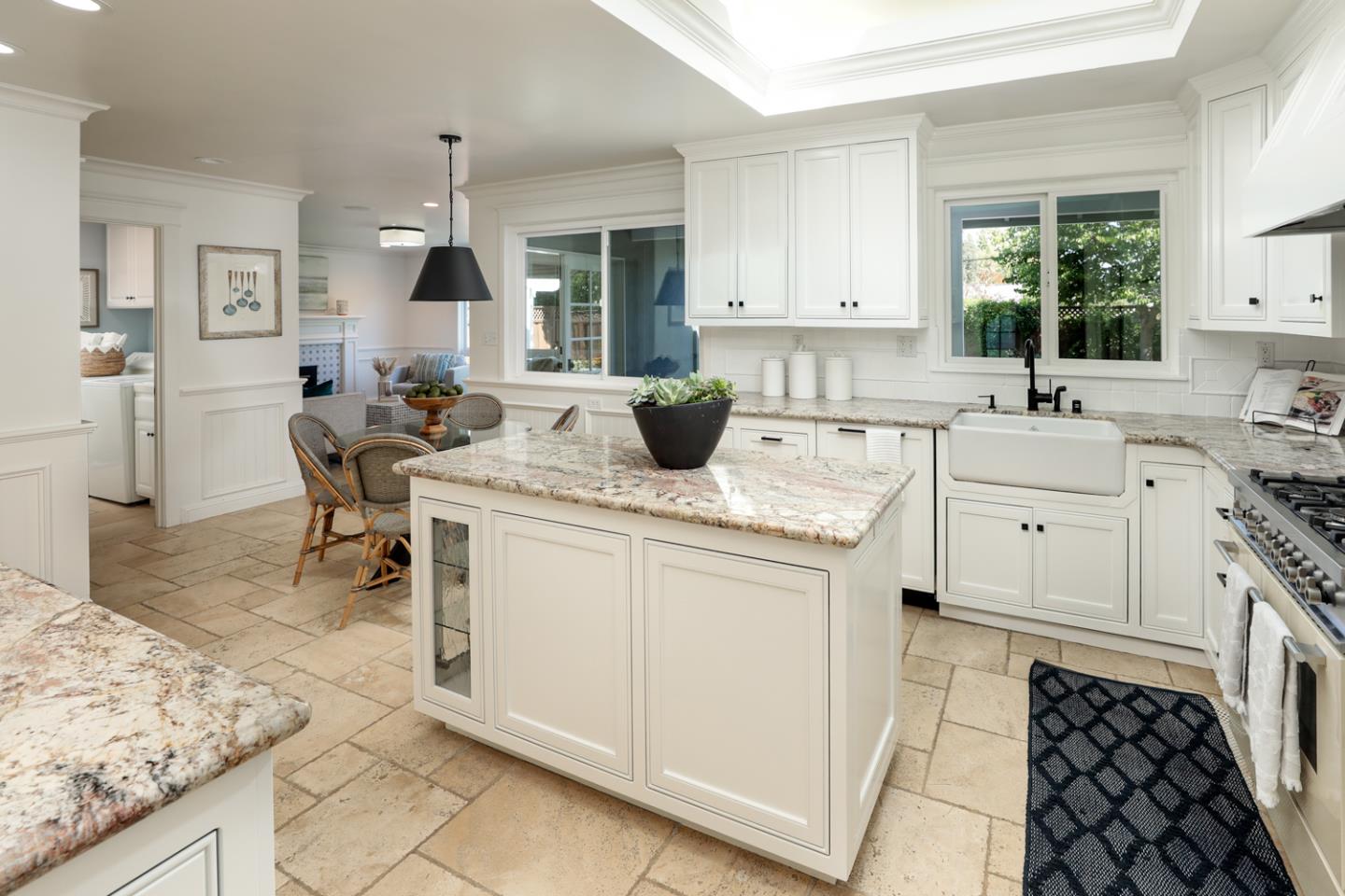 970 Gest Drive Mountain View, CA 94040 - Photo 12 of 53 a kitchen with sink cabinets and stove