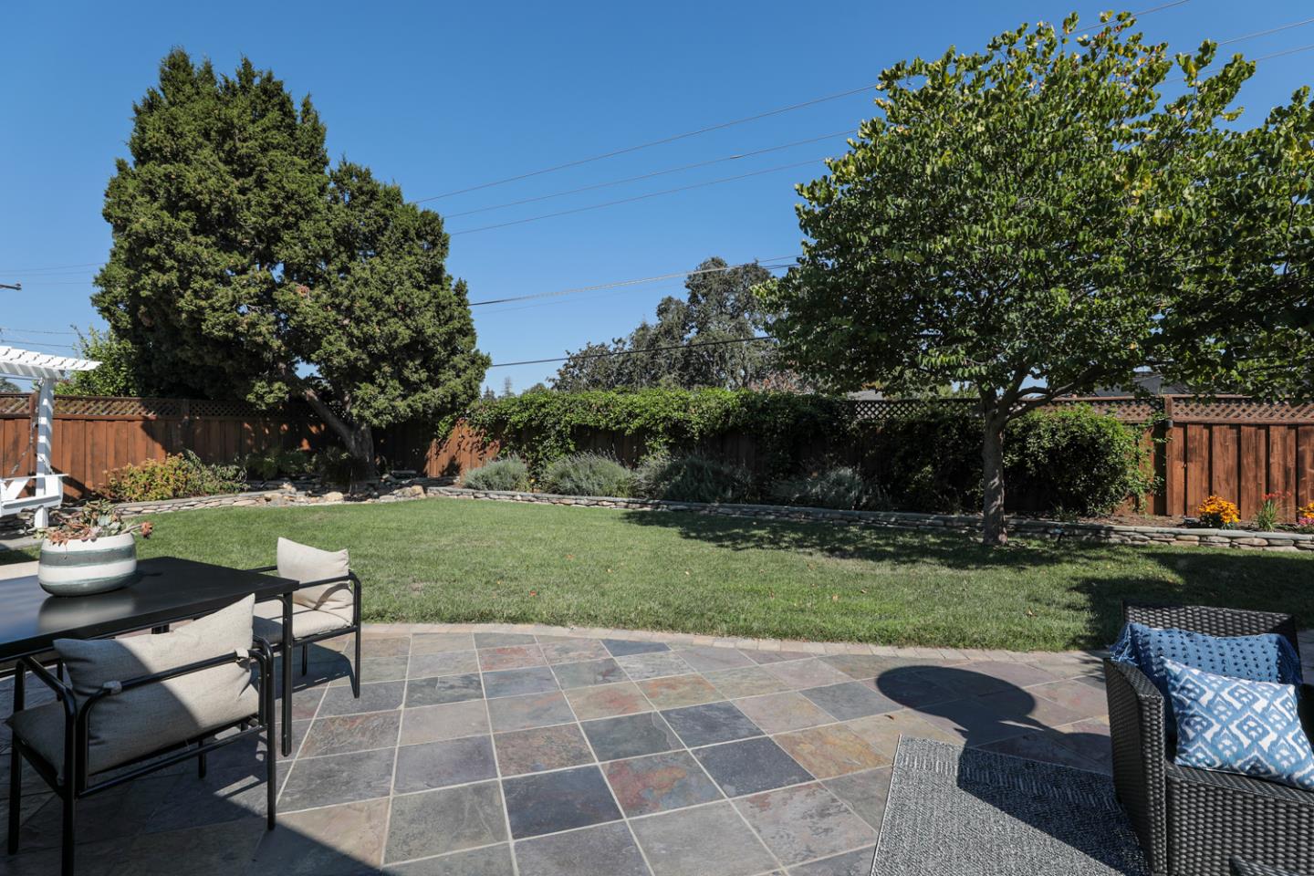 970 Gest Drive Mountain View, CA 94040 - Photo 23 of 53 a view of a backyard with sitting area